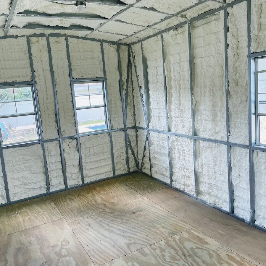 Closed-cell spray foam insulation applied to wall cavities in a residential project in Apple Valley